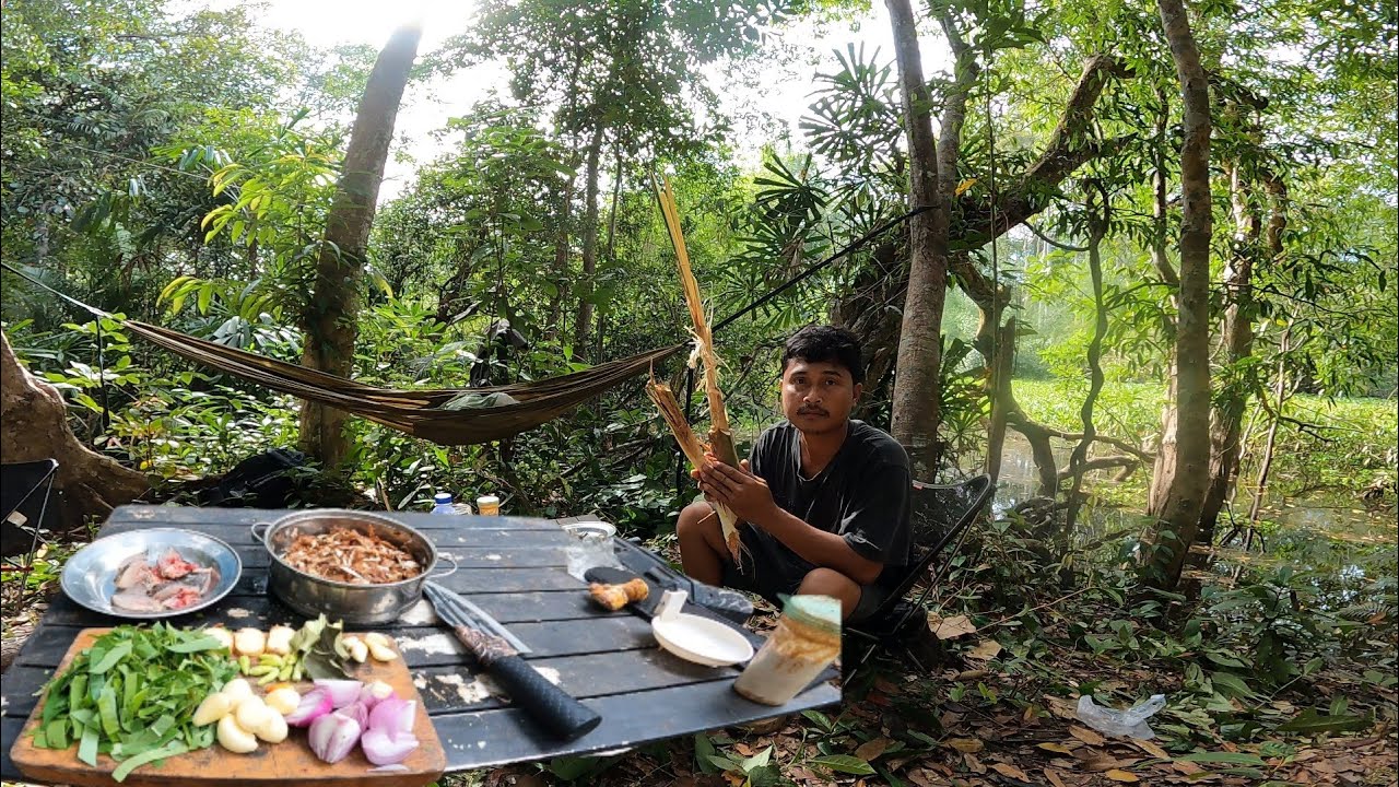 Camping fishing. Sour lemongrass leaves with fried fish sauce