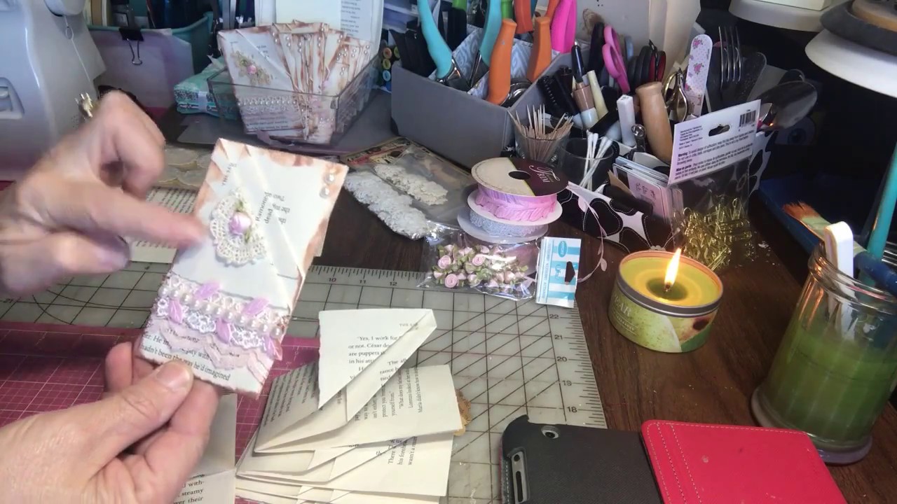 Altered book pages into triple tuck spots