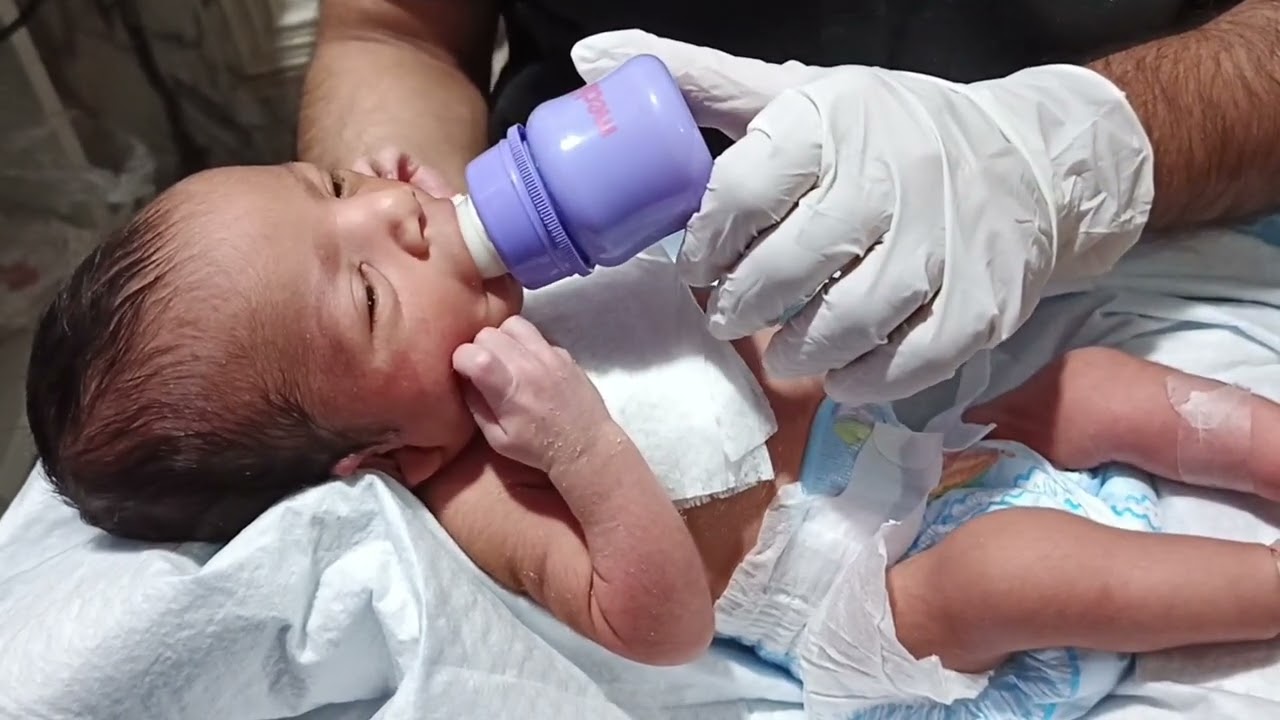 Precious Newborn Feeding Time Under Observation 💠