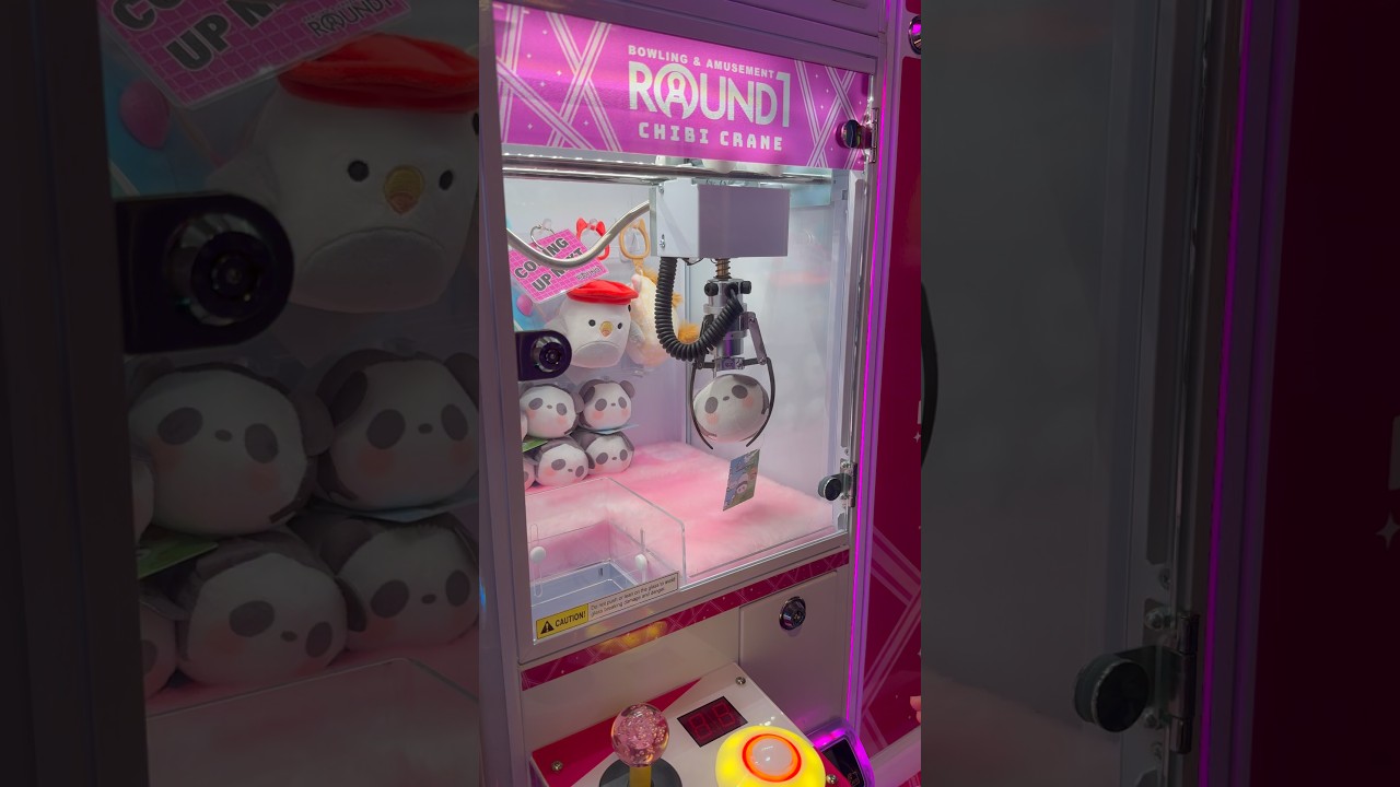 Playing round one arcade, mini claw machines ￼