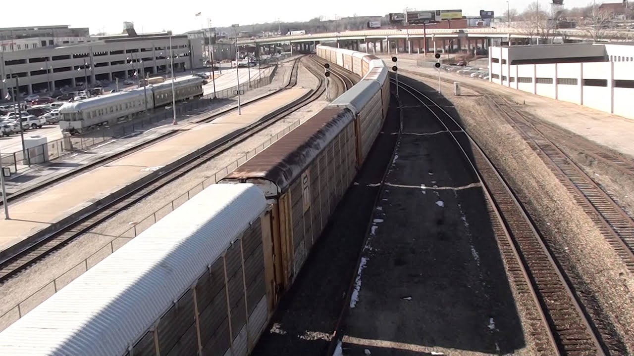 CSX #5293 leads UP EB Auto Train with CREX Dash-8 (Ex. UP). Kansas City, MO 1/14/12