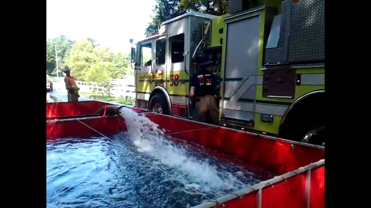 Mutiple Tankers Pulling Up to Dump Site and Dumping Their Tank *Drill*