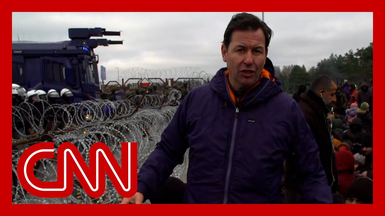Water cannons aimed at migrants in tense border standoff