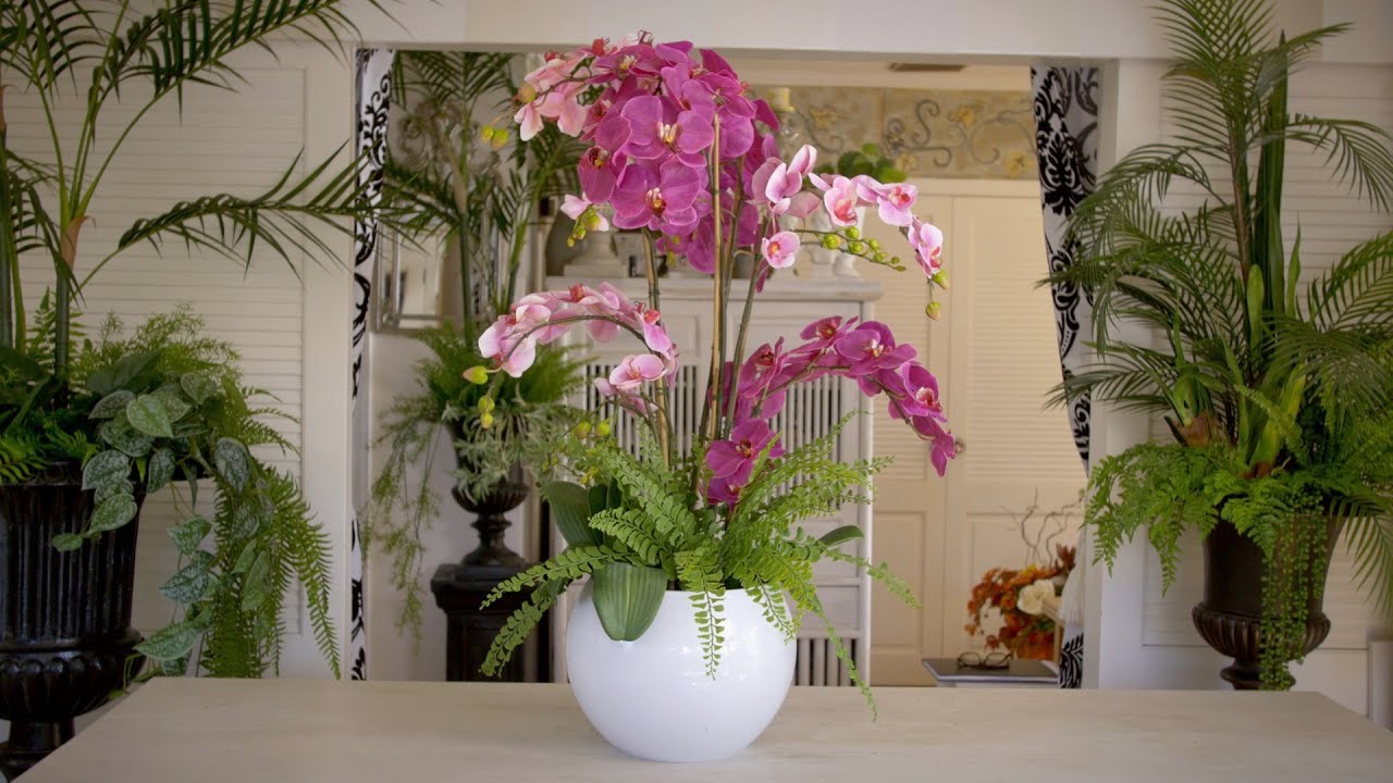 A lush tropical Orchid floristry design