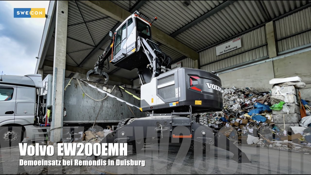 Volvo EW200EMH... Demoeinsatz des Volvo Umschlagbaggers