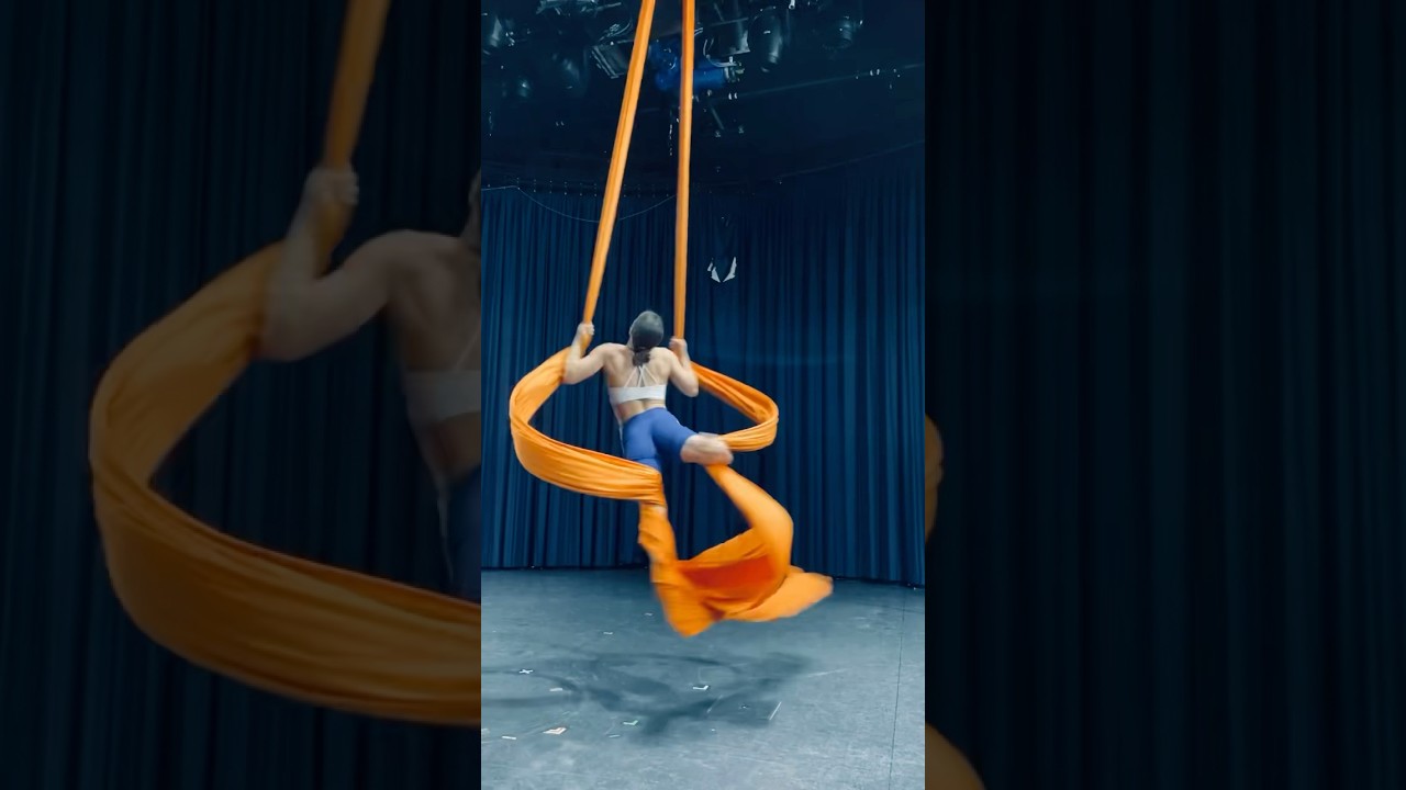 Aerial silks dance in the air. Spinning training. #aerialsilks #aerialist #circus