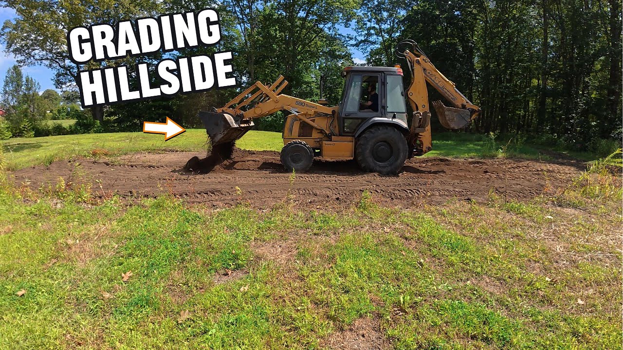 Moving Topsoil to Grade Out Hill Side Part 2