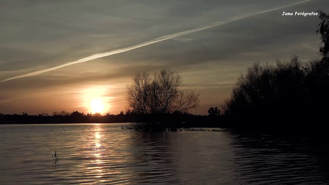 Atardecer en el Rocío. frente a la ermita