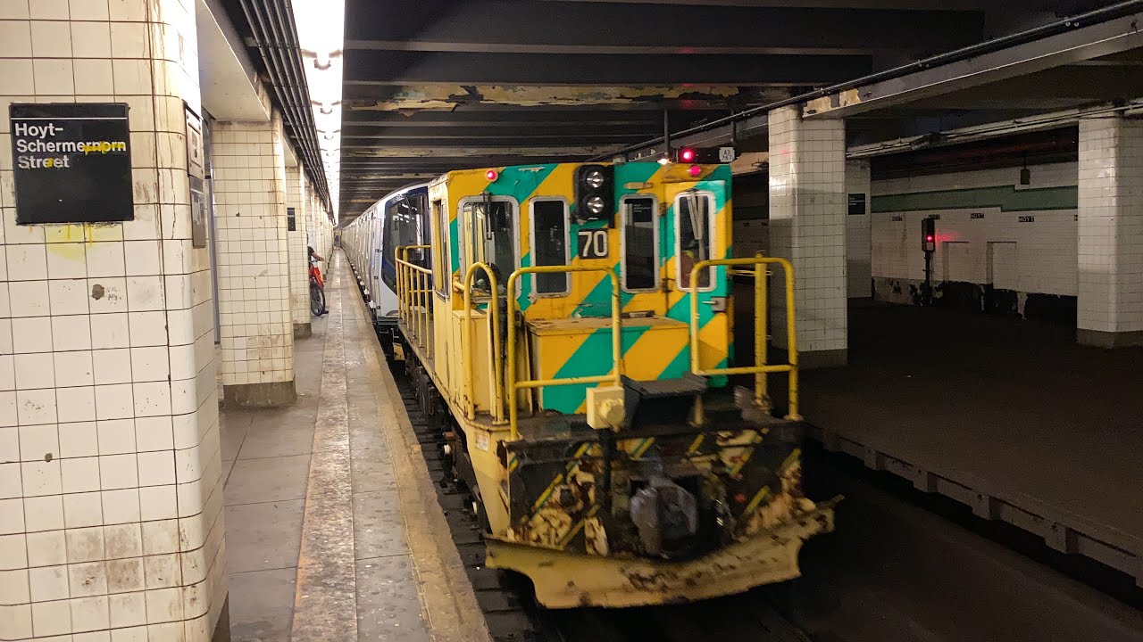 R211 transfer train being pulled by diesels passing Hoyt - Schermerhorn Sts