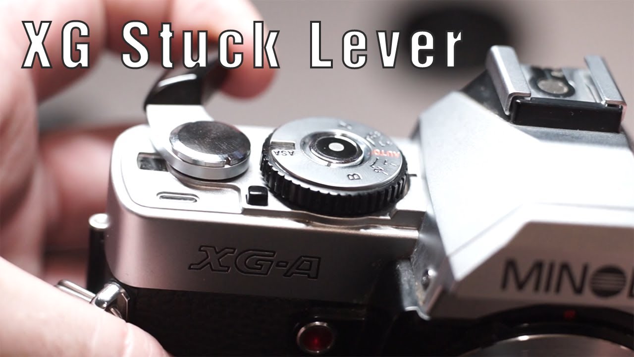 How to fix Minolta XG-1 stuck film advance lever (XG-7, XG-9, XG-E, XG-A, XG-M, X-700, X-570, X-370)