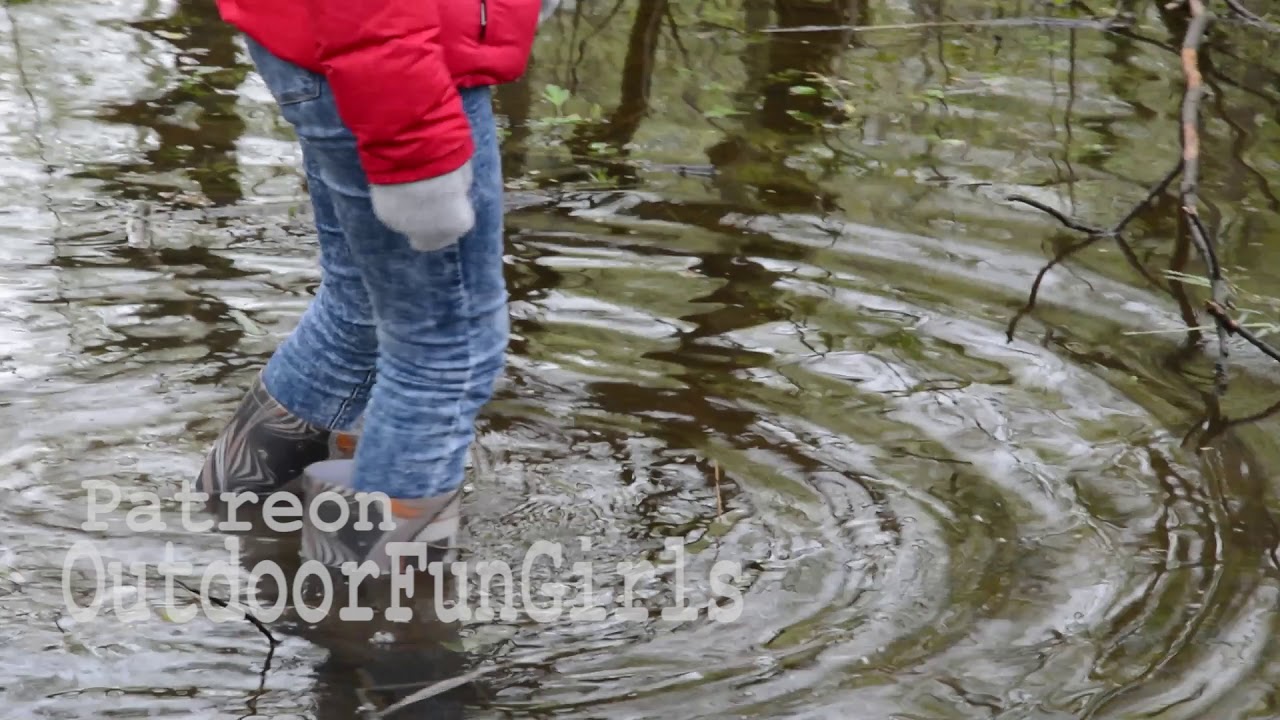 Girl wet rubber boots