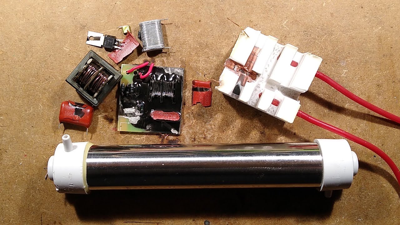 Inside a nasty high voltage ozone generator PSU.  (with schematic)