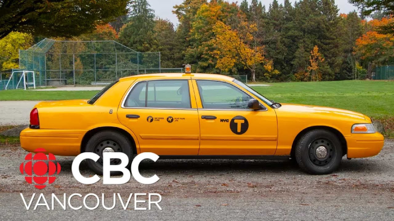 Local car enthusiast driving around downtown Vancouver in New York City cab
