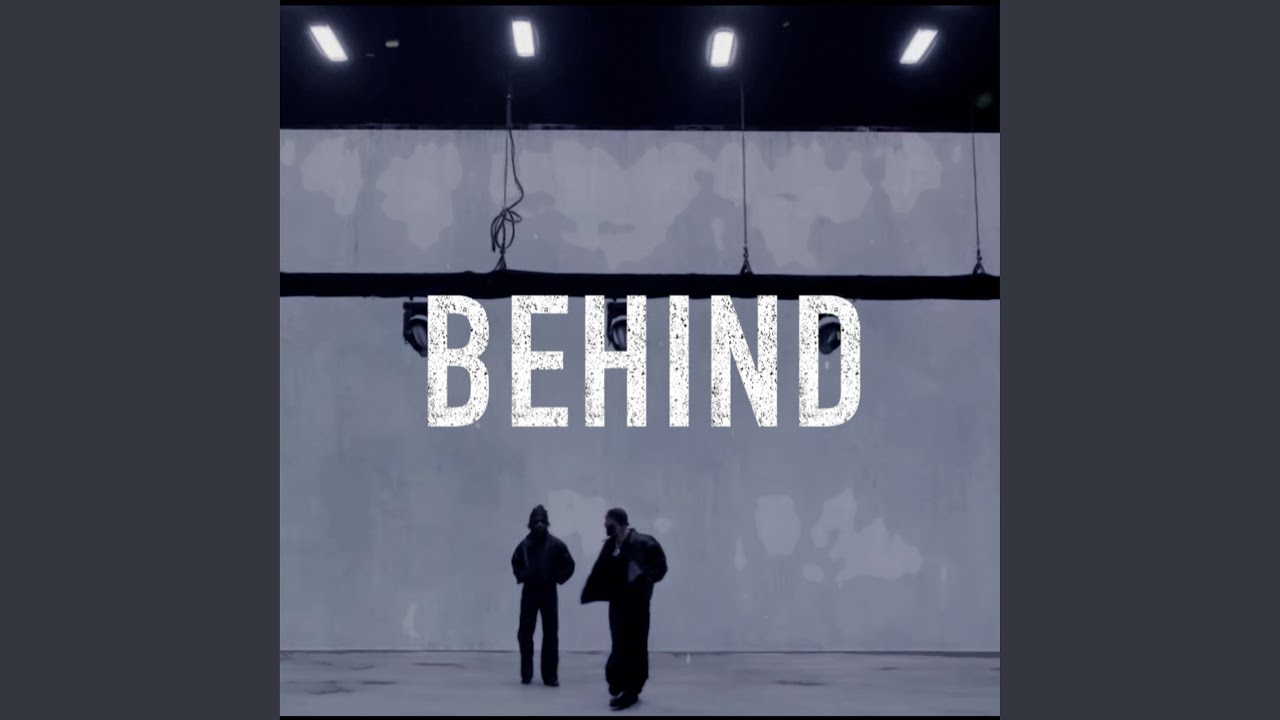Behind