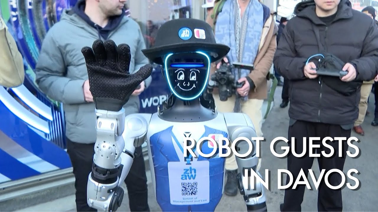 Robots parade through Davos streets, attracting attention