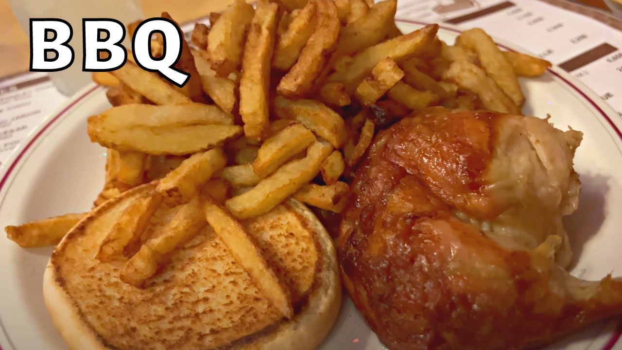 New Yorker Eats Chicken Meal at Famous Chalet Bar-B-Q Montreal Diner