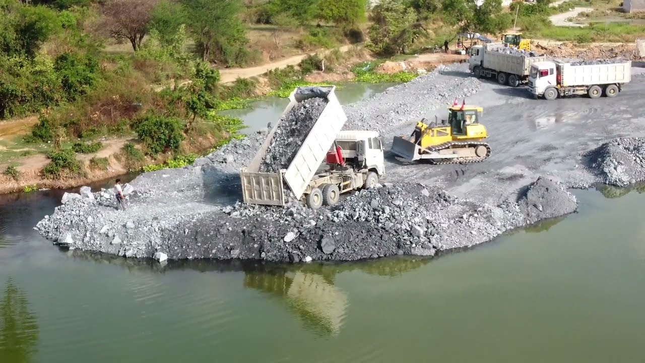wonderful project New Action Stronger heavy Dozer working push Rock  building foundation New Road