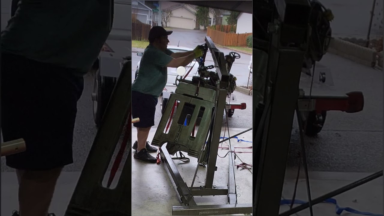 dropping a 750lb surface grinder off of a trailer