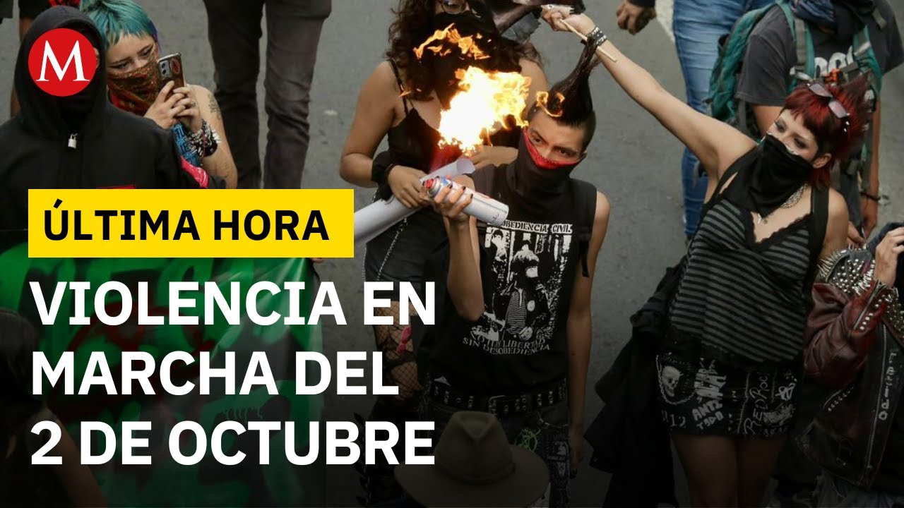 Encapuchados agreden a polic&iacute;as durante la marcha por el 2 de octubre