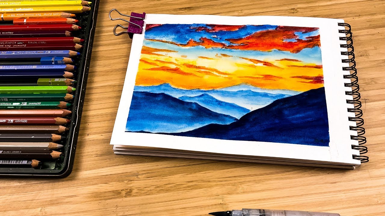 Dramatic sunset landscape painting tutorial with watercolor pencils