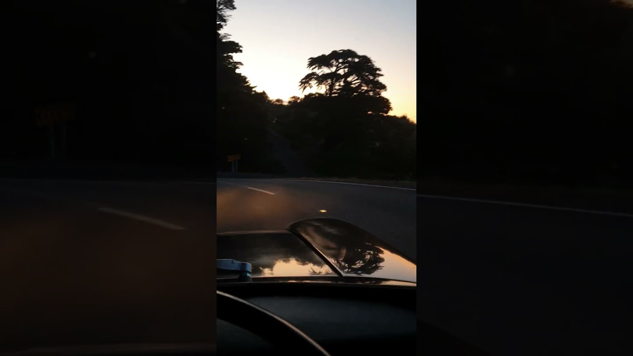 Austin 3-Litre driving home early evening