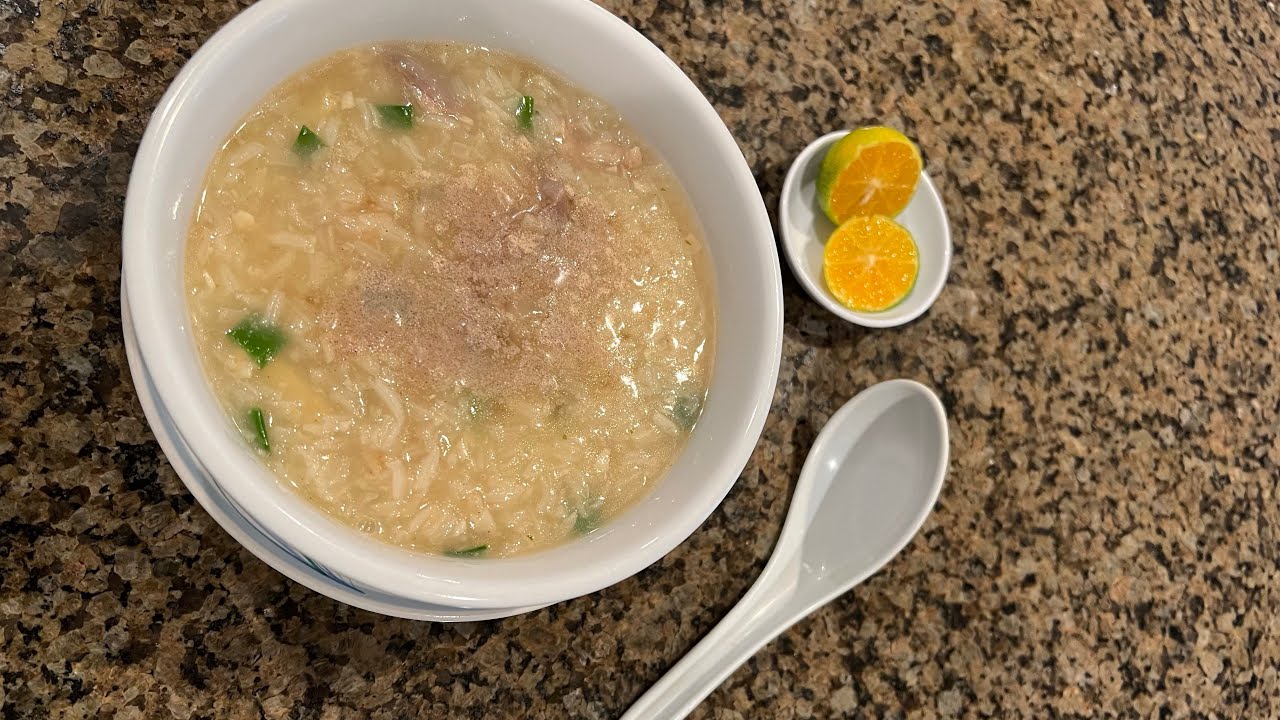Goto (porridge) using Pork ￼ stomach garnished with roasted garlic & scallions.