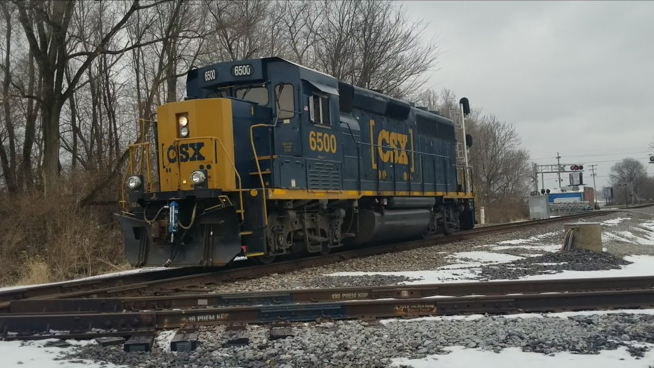 CSX 6500 leads J705 Light through Terre Haute, IN