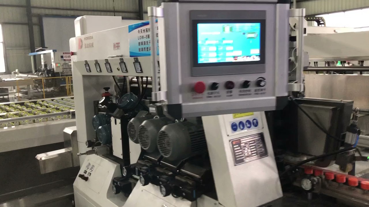 HONGDA Glass Double edger line for crude grinding. 12+2 low e removal motors.