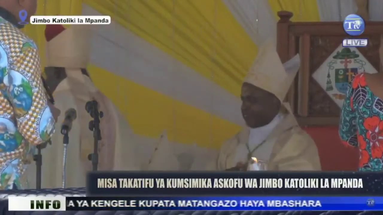 ASKOFU E. NZIGILWA ASIMIKWA RASMI KUWA ASKOFU WA JIMBO LA MPANDA, AKABIDHIWA FIMBO YA KICHUNGAJI