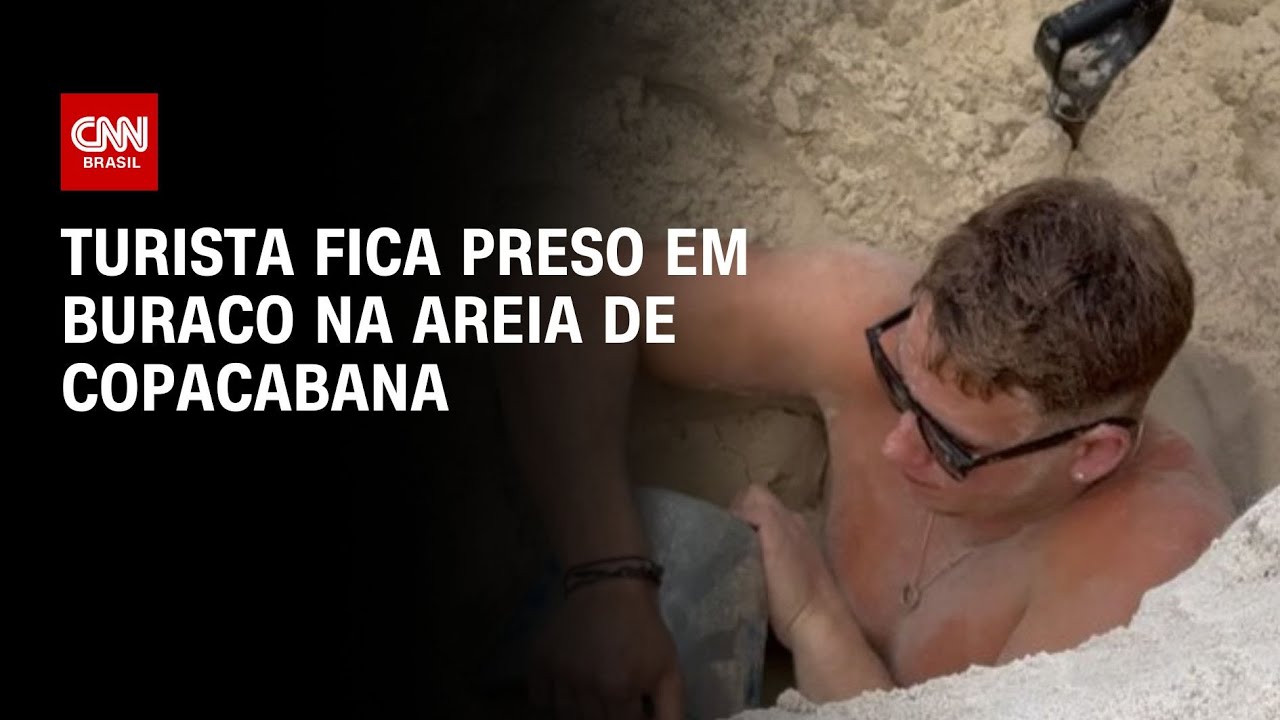 Turista fica preso em buraco na areia da praia de Copacabana, Rio de Janeiro | AGORA CNN
