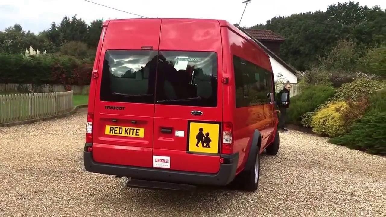 Red Transit 17 seat minibus