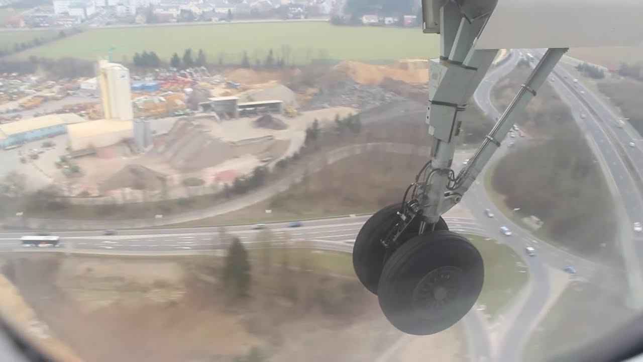 LUXAIR DASH 8Q400 LANDING LUXEMBOURG