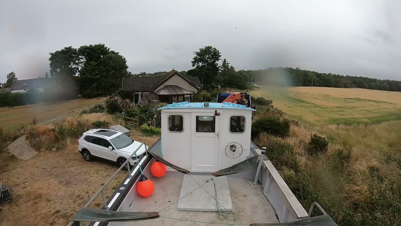 GoPro time lapse - transporting Cygnus 26 from Spey Bay to Findochty, Northeast Scotland.