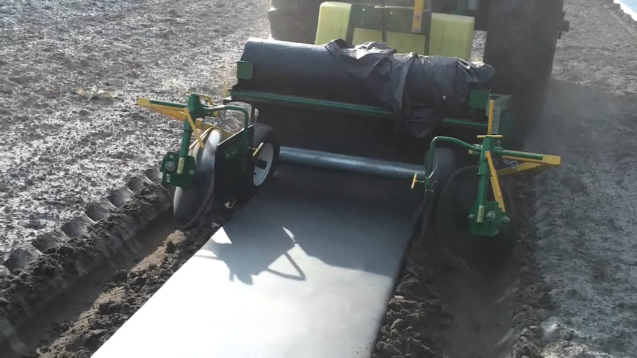 Laying Plastic for my Vegetable Garden