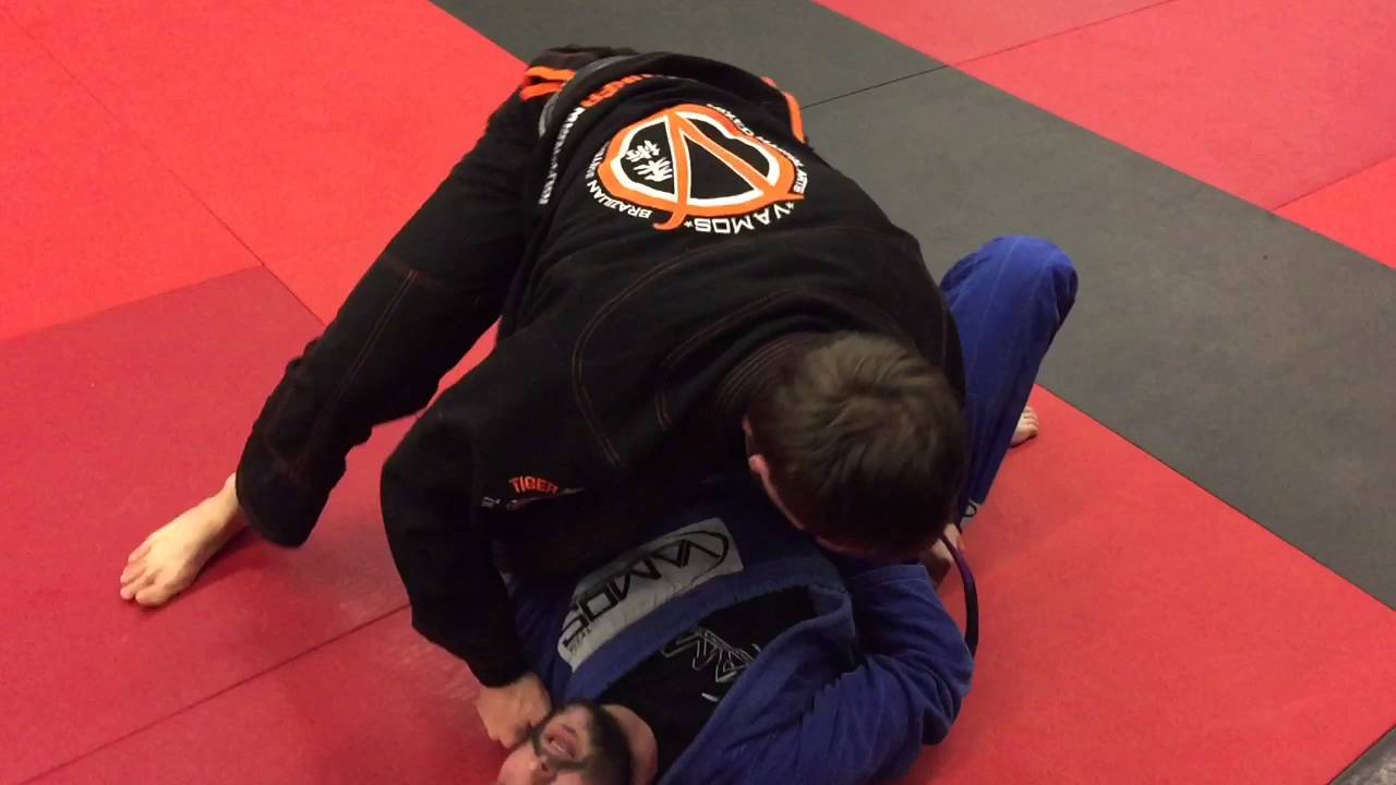 Professor Alex rolling with Coach Al at Vamos Mixed Martial Arts