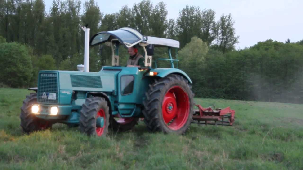 Hanomag Robust 901 mit Lely Kreiselegge