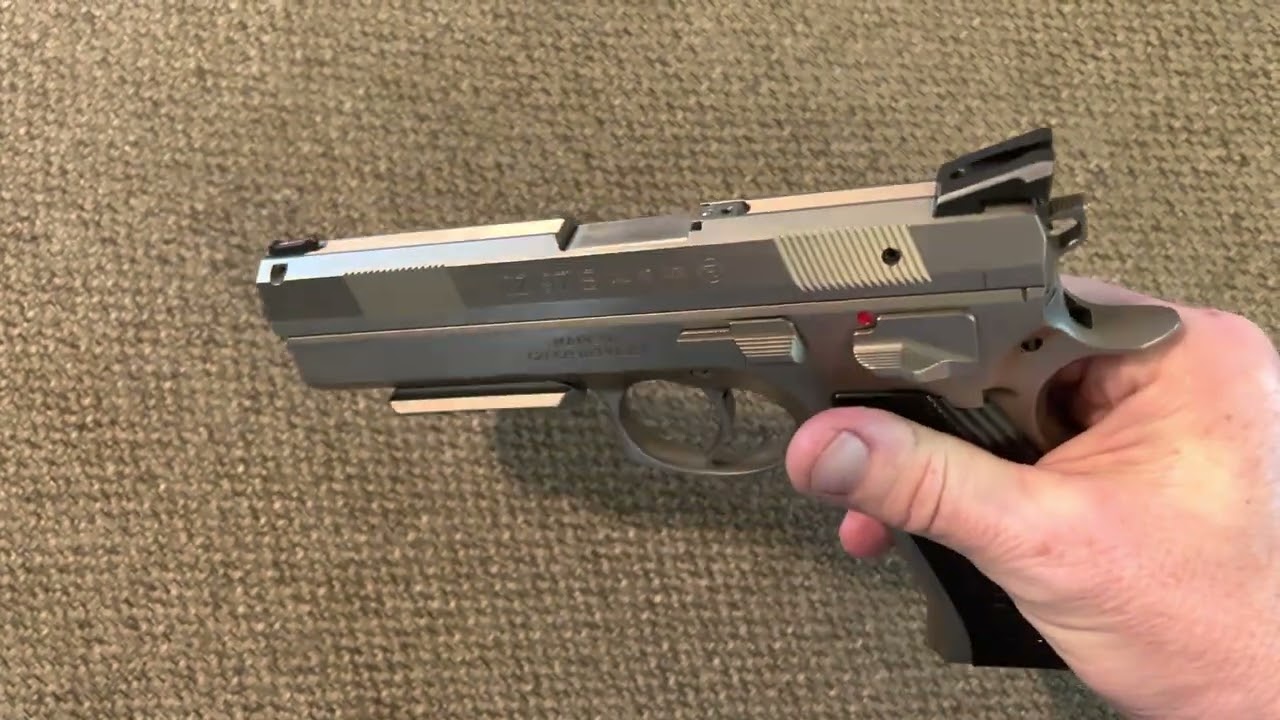 CZ 97B 45 ACP CGW Cajun Gun Works custom, reflecting like a diamond with an elusive NP3+ NP3 coating