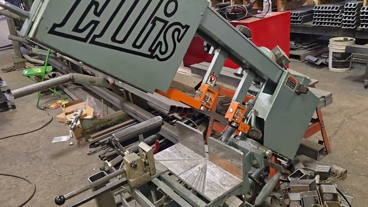 Features and use of an Ellis double miter horizontal metal cutting band saw.  Minnesota Implement.