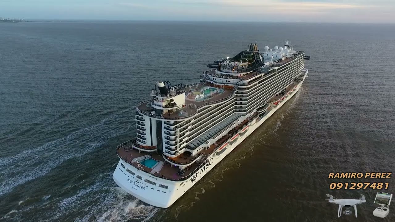 VIDEO DRON GRAN CRUCERO SEAVIEW DE MSC, AMARRADO Y PARTIENDO DESDE  MONTEVIDEO AL ATARDECER.