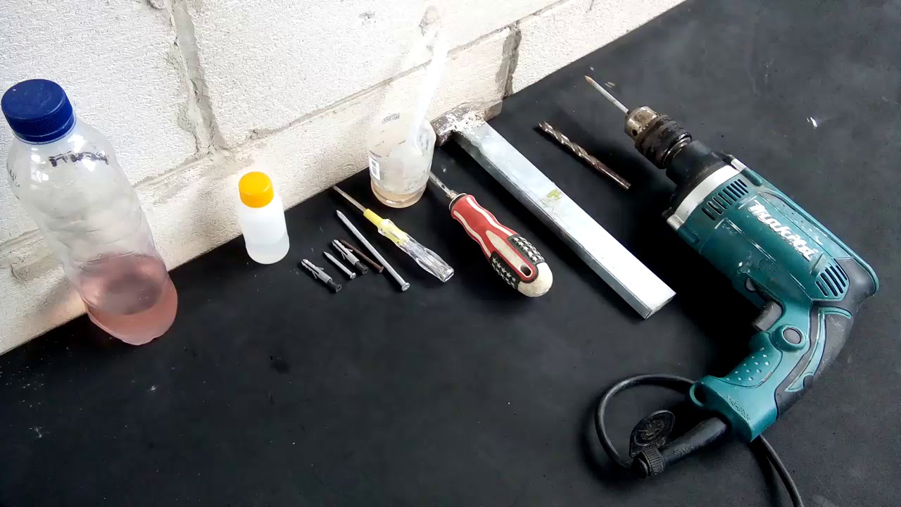 Cara  pasang paku pisher dinabol pada bataringan