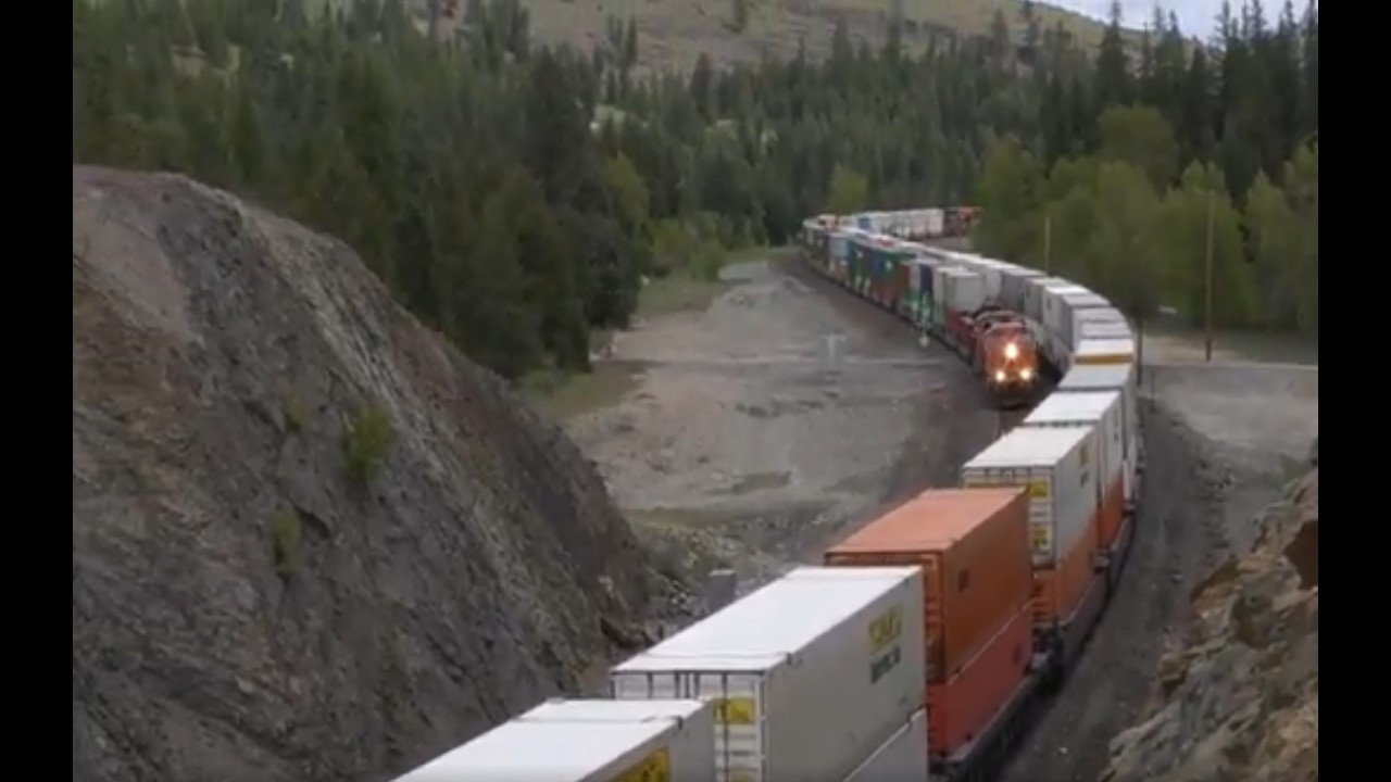 Action at Fisher River. where 10,000 Foot Long Stack Trains Meet. (4K)