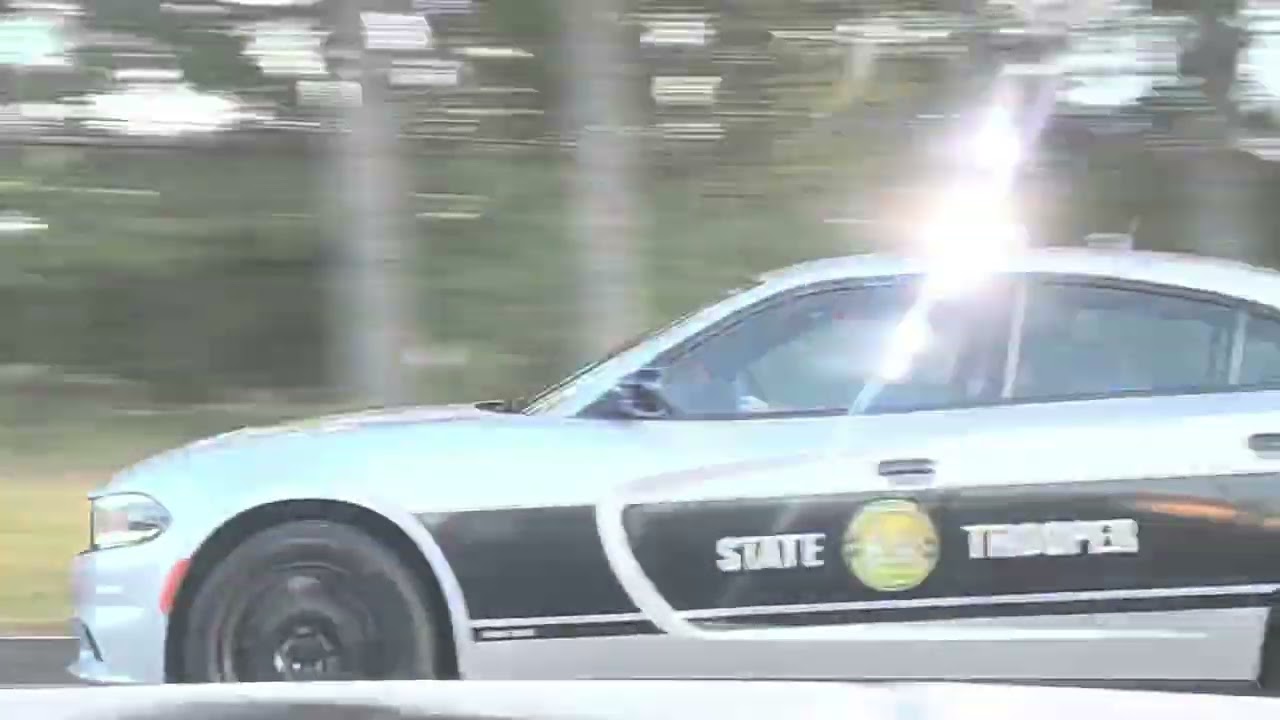 2 North Carolina State Highway Patrol State Troopers Responding Code 3 fast to a call