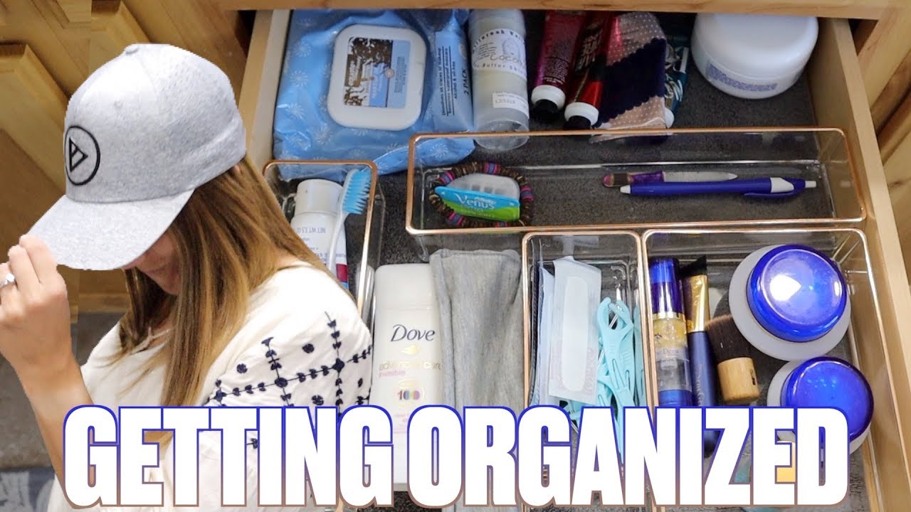 BATHROOM ORGANIZATION TIPS AND TRICKS | GETTING ORGANIZED IN THE BATHROOM | NEW MERCH LAUNCH
