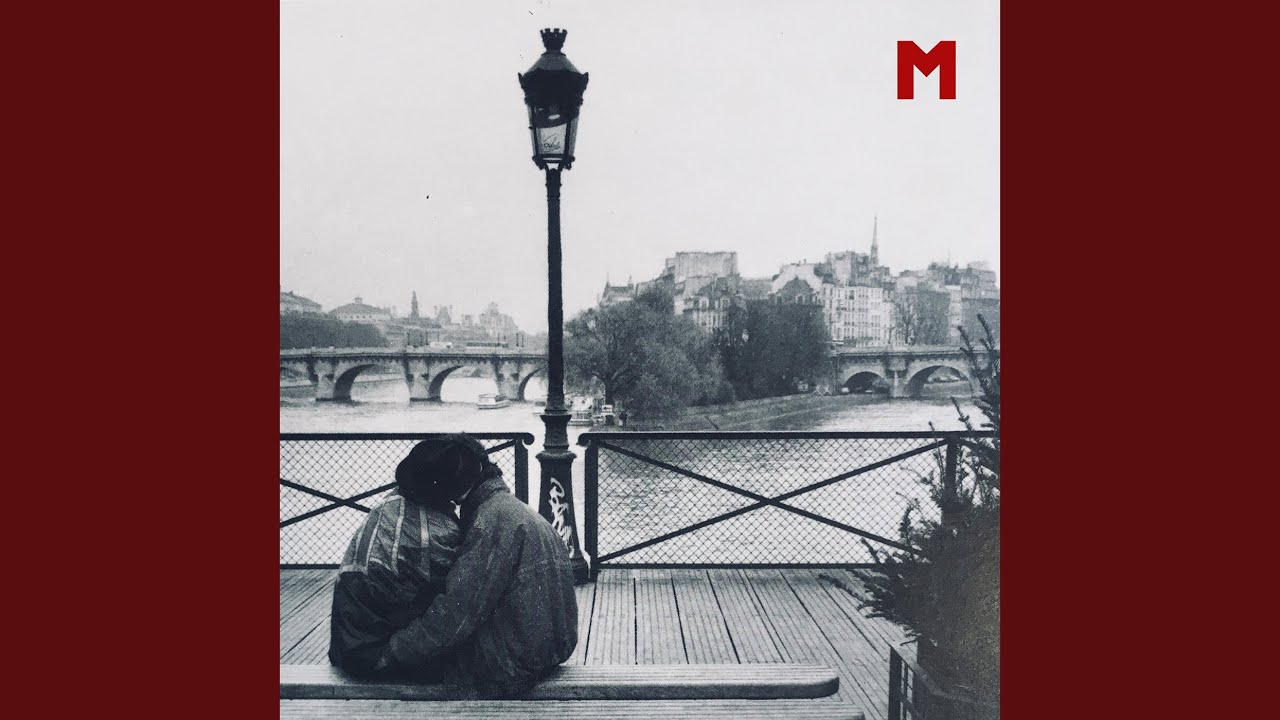 M.