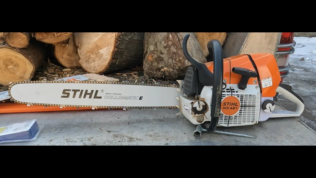 Stihl MS461 bucking up big maple log. Cutting splitting and delivering firewood from log to heat.