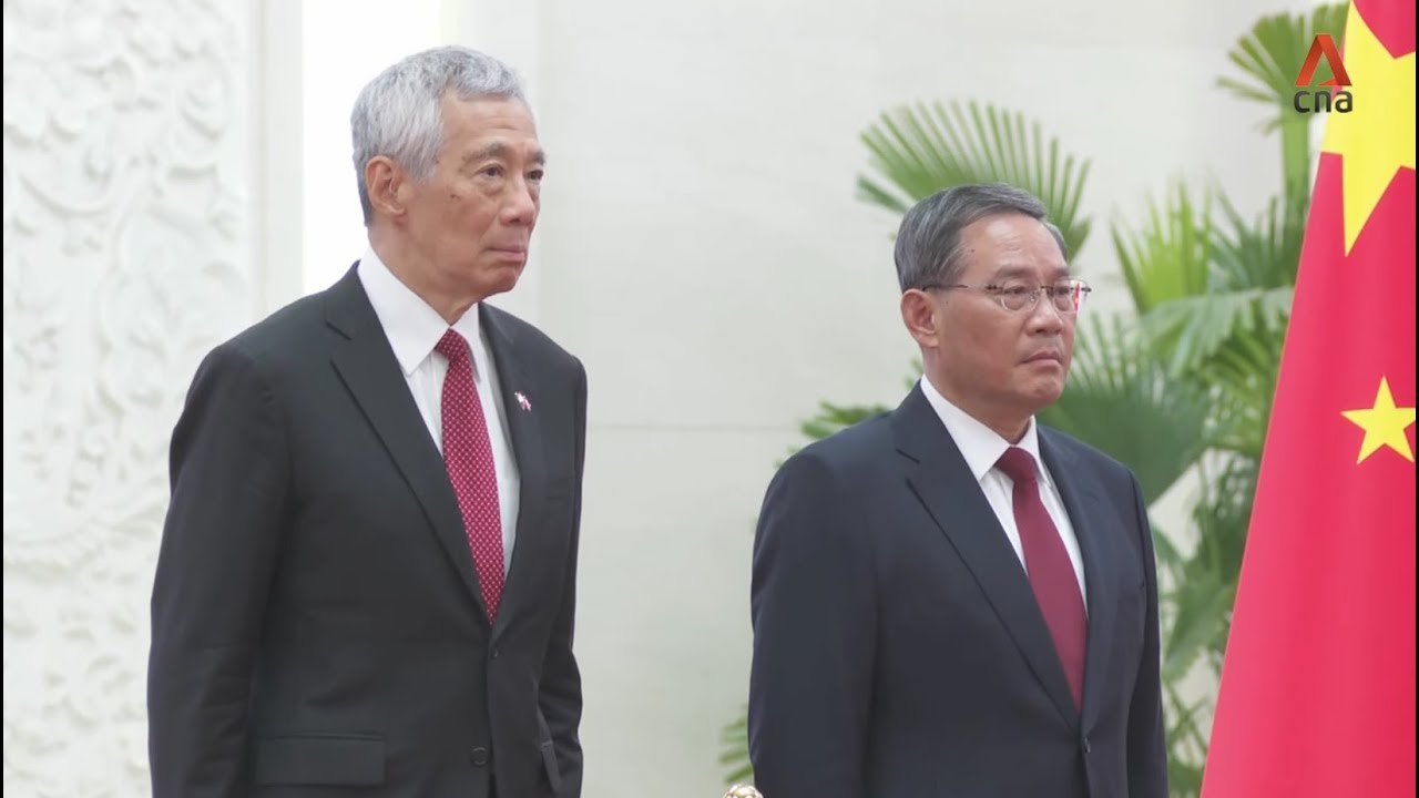 China Premier Li Qiang welcomes PM Lee at a ceremony in Beijing