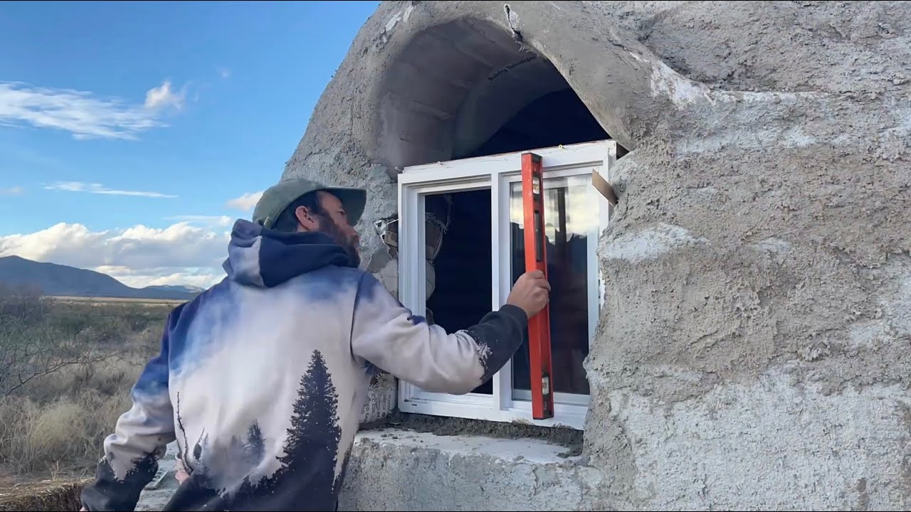 SuperAdobe dome window install