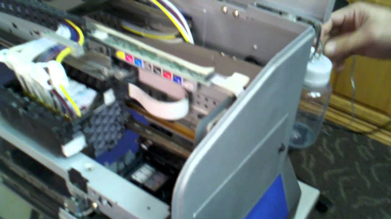 Omniprint freejet 320 Direct to Garment Printer Wet cap cleaning system to avoid head clogs.