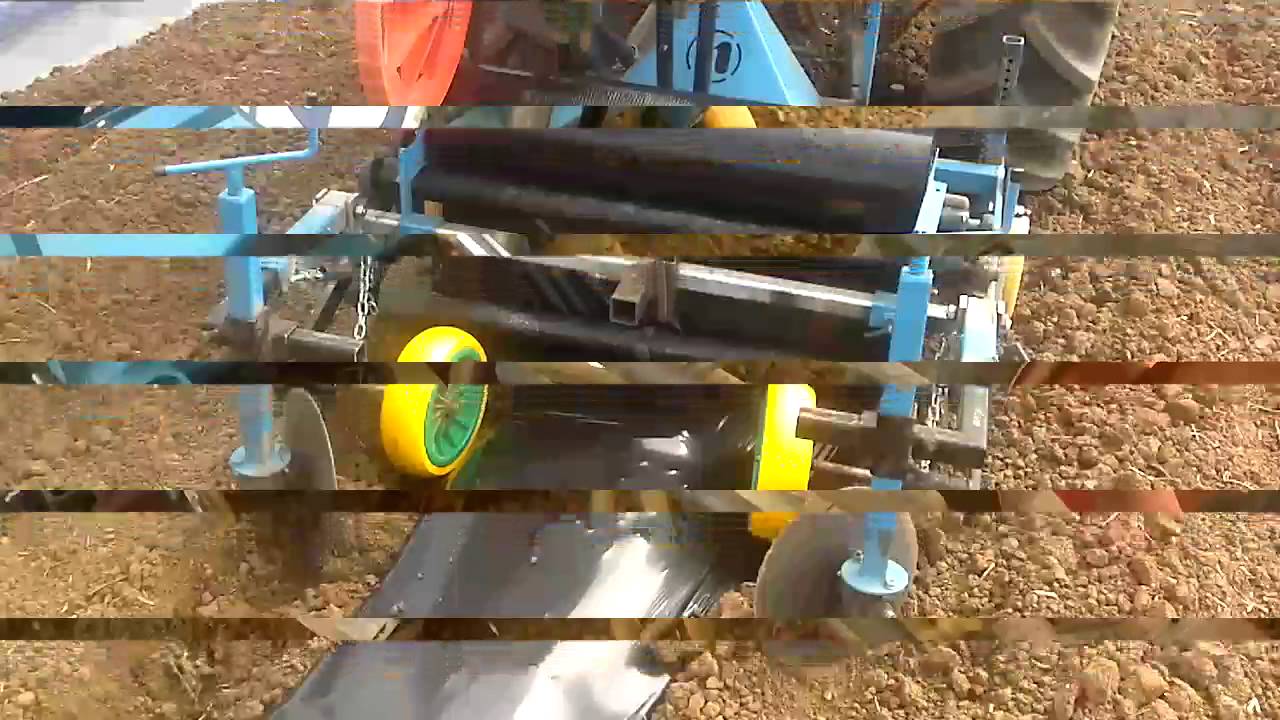 MÁQUINA DE APLICAR PLÁSTICO COM ADUBADOR