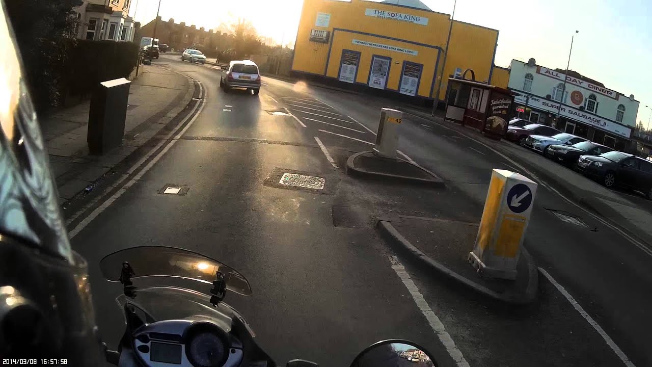 Mobius camera in Joovuu waterproof case, on motorcycle helmet